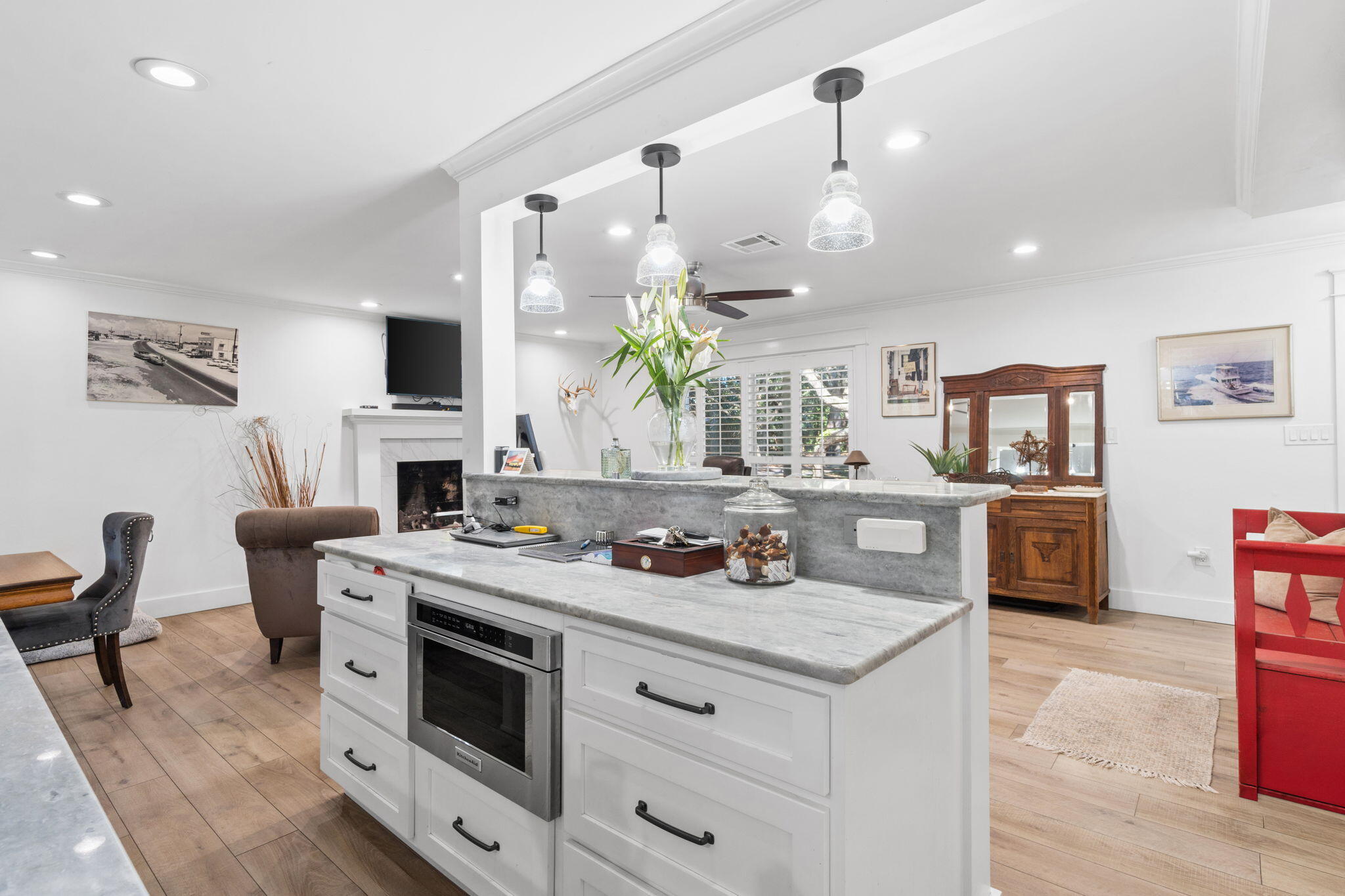 517 Main Street Destin, FL 32541 - Photo 10 of 14 a kitchen with a stove cabinets and chairs