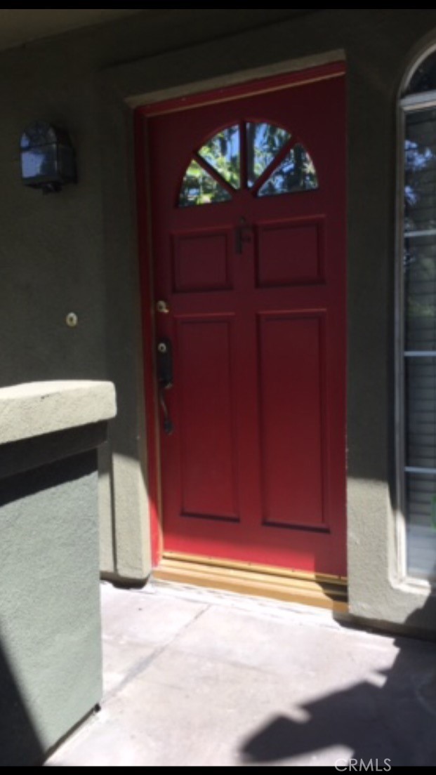 8330 South Somerset Ranch Road, Unit F Paramount, CA 90723 - Photo 1 of 1 a view of a hallway with wooden floor