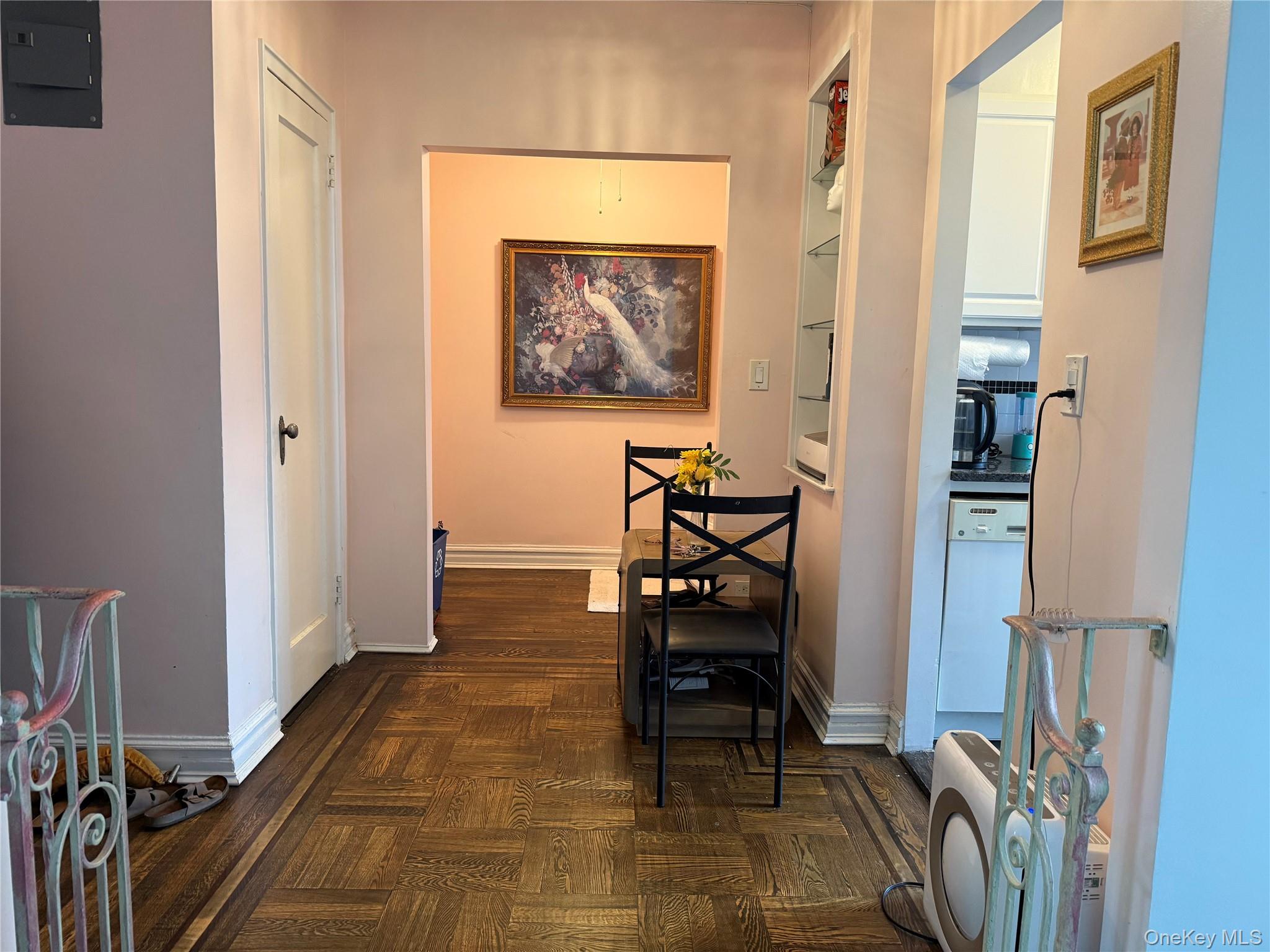 30 Clinton Place, Unit 3A New Rochelle, NY 10801 - Photo 5 of 5 a dining room with furniture and a rug
