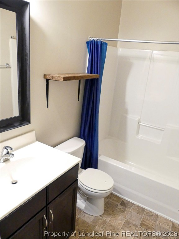 80 Pedley Place Cameron, NC 28326 - Photo 14 of 34 a bathroom with a sink a toilet a mirror and shower