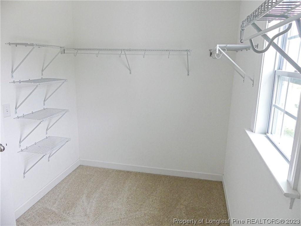 80 Pedley Place Cameron, NC 28326 - Photo 25 of 34 a view of an empty walk in closet