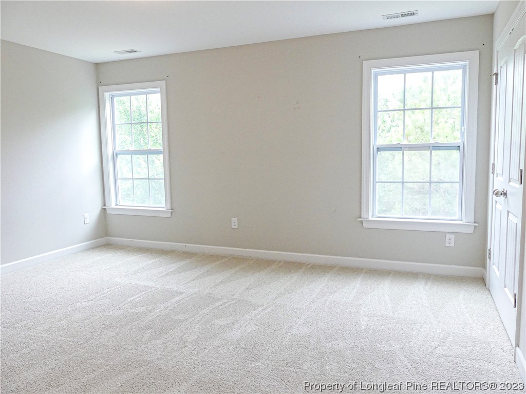 80 Pedley Place Cameron, NC 28326 - Photo 27 of 34 an empty room with windows
