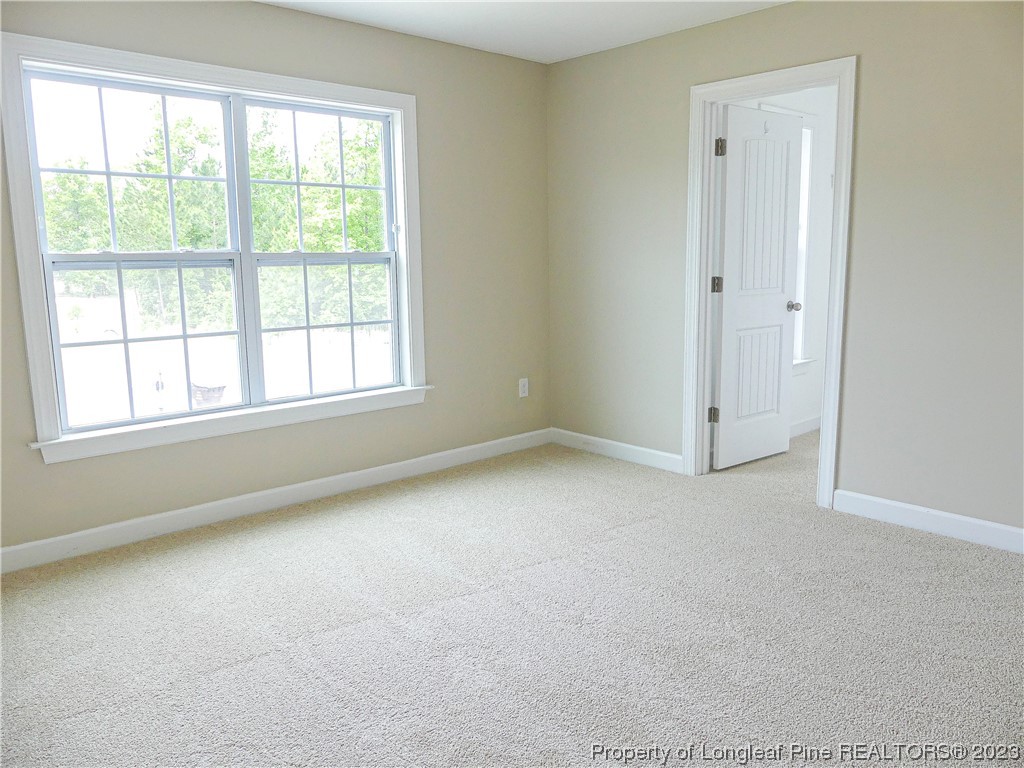 80 Pedley Place Cameron, NC 28326 - Photo 30 of 34 an empty room with a window