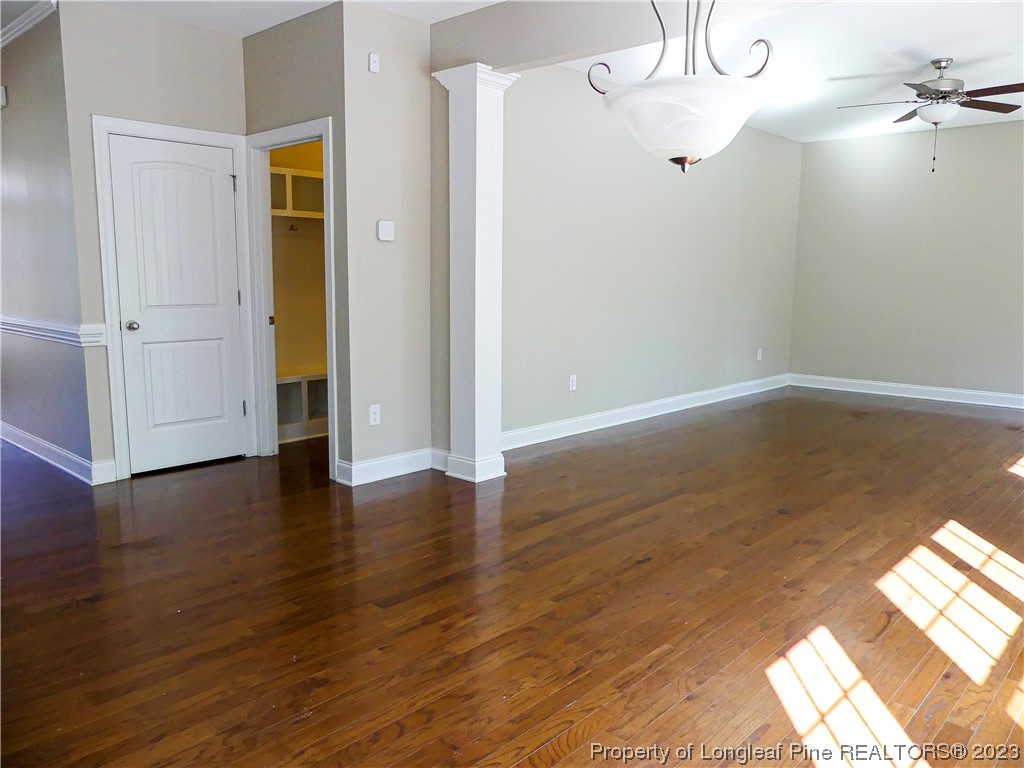 80 Pedley Place Cameron, NC 28326 - Photo 3 of 34 a view of an empty room with wooden floor and a window