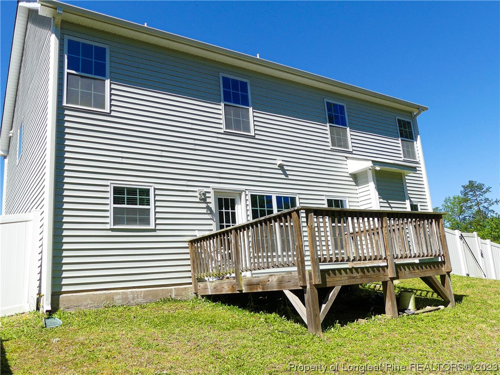 80 Pedley Place Cameron, NC 28326 - Photo 32 of 34 a view of deck house with a yard deck and a garden