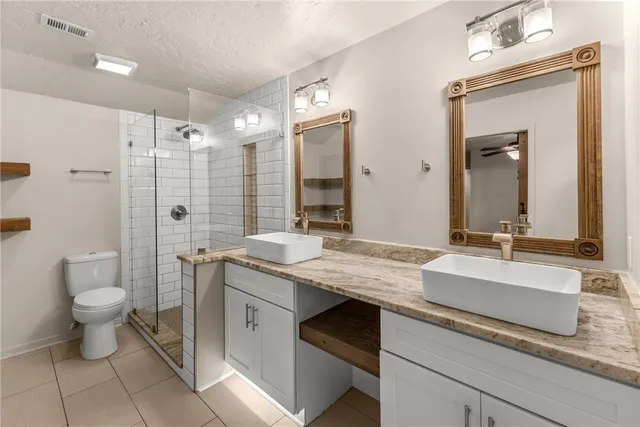 a front view of a house with yard porch and seating area