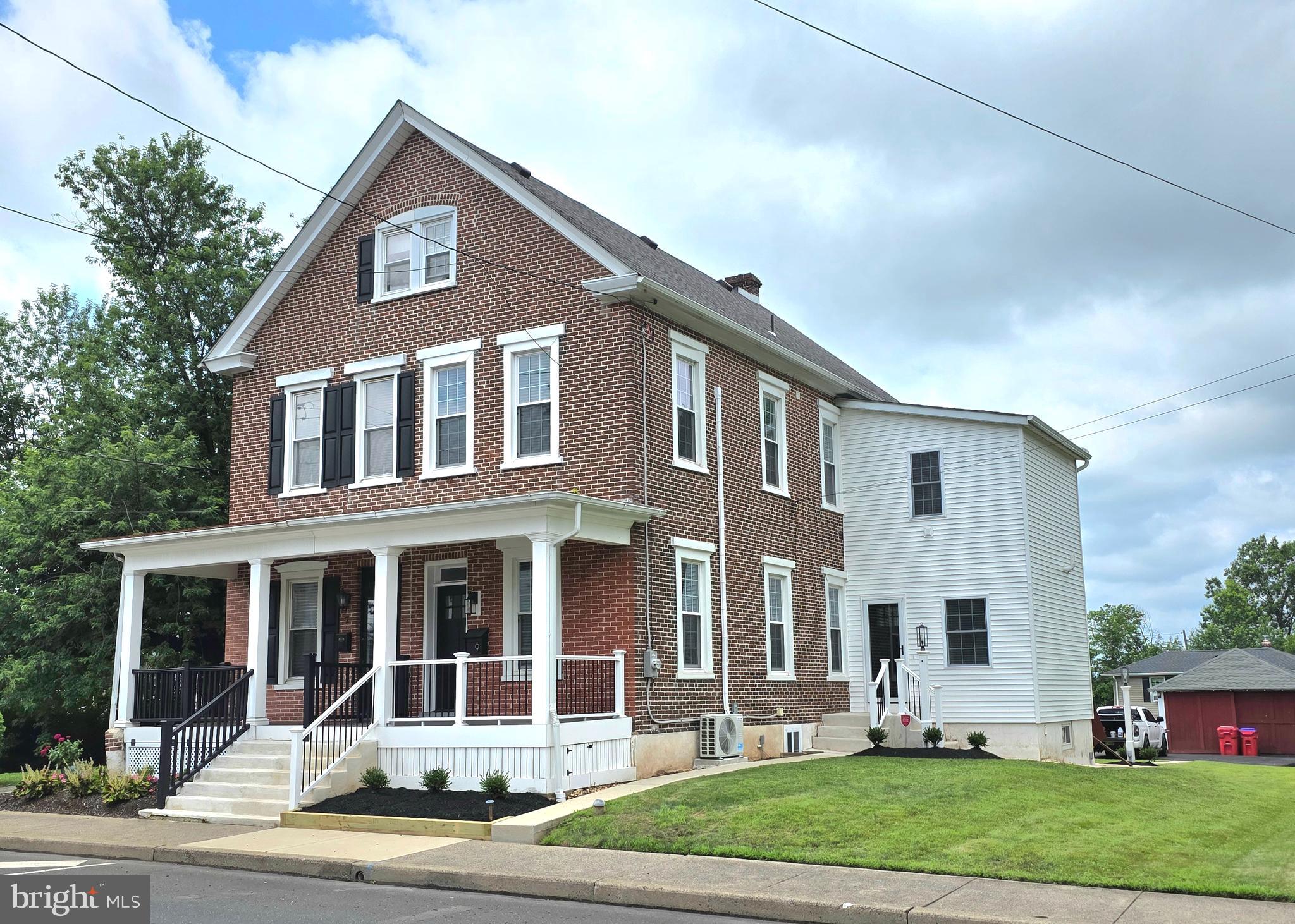9 East Reliance Road Souderton, PA 18964 - Photo 1 of 16 a front view of a house with a yard