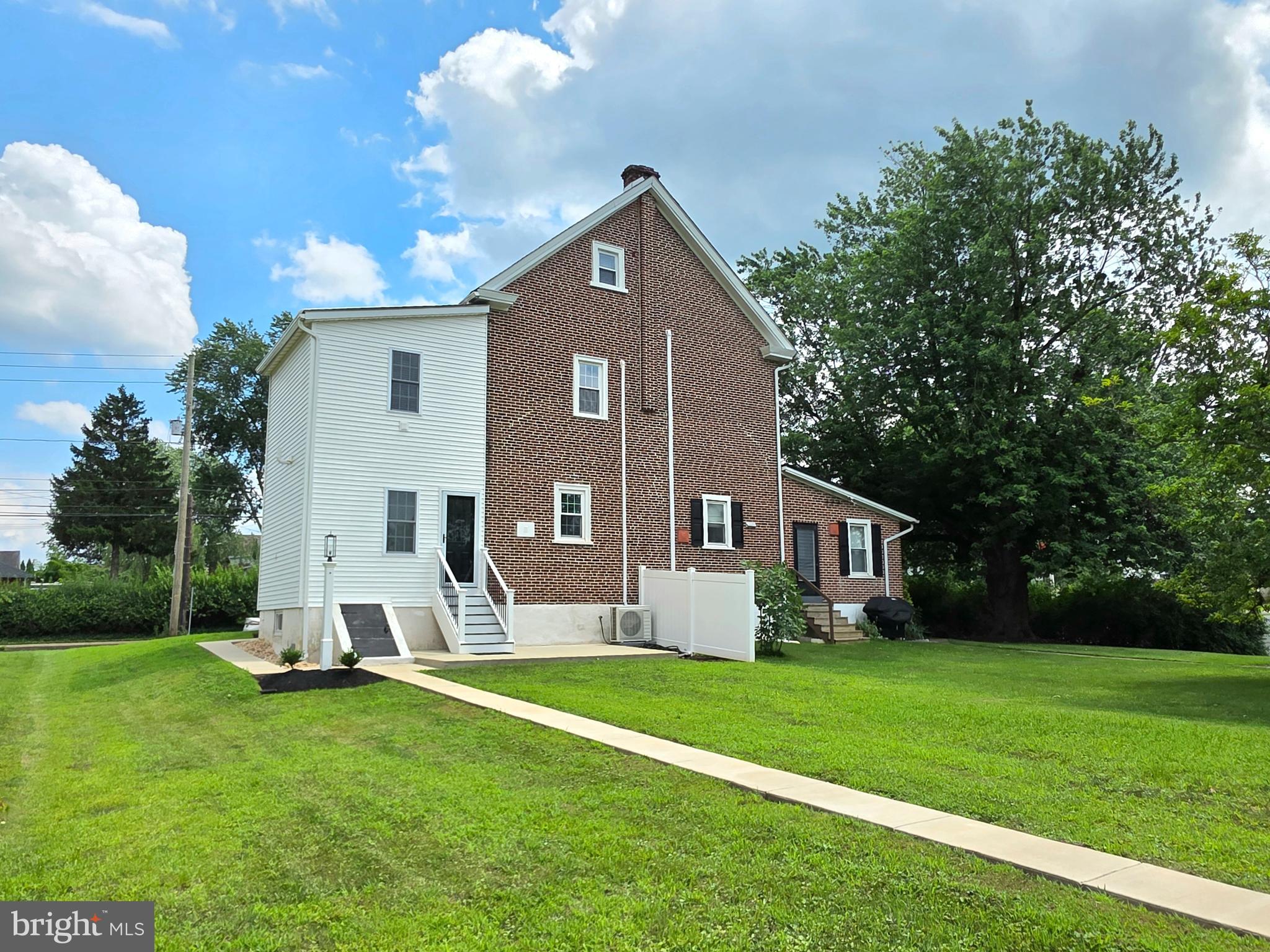 9 East Reliance Road Souderton, PA 18964 - Photo 16 of 16 a front view of house with yard and green space