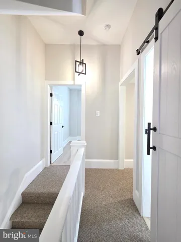 a view of a bathroom with shower