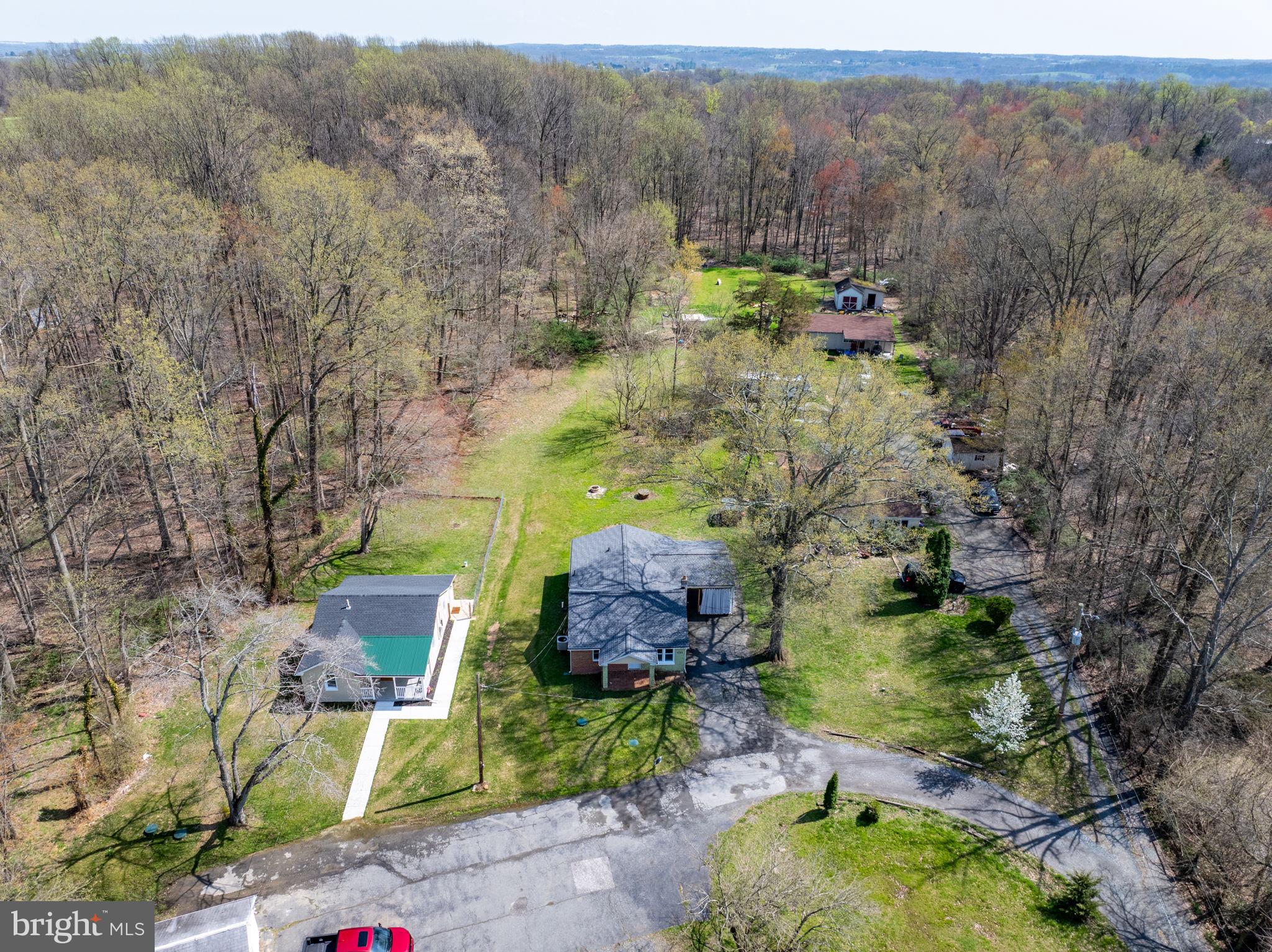 Serene homes nestled in nature's embrace.