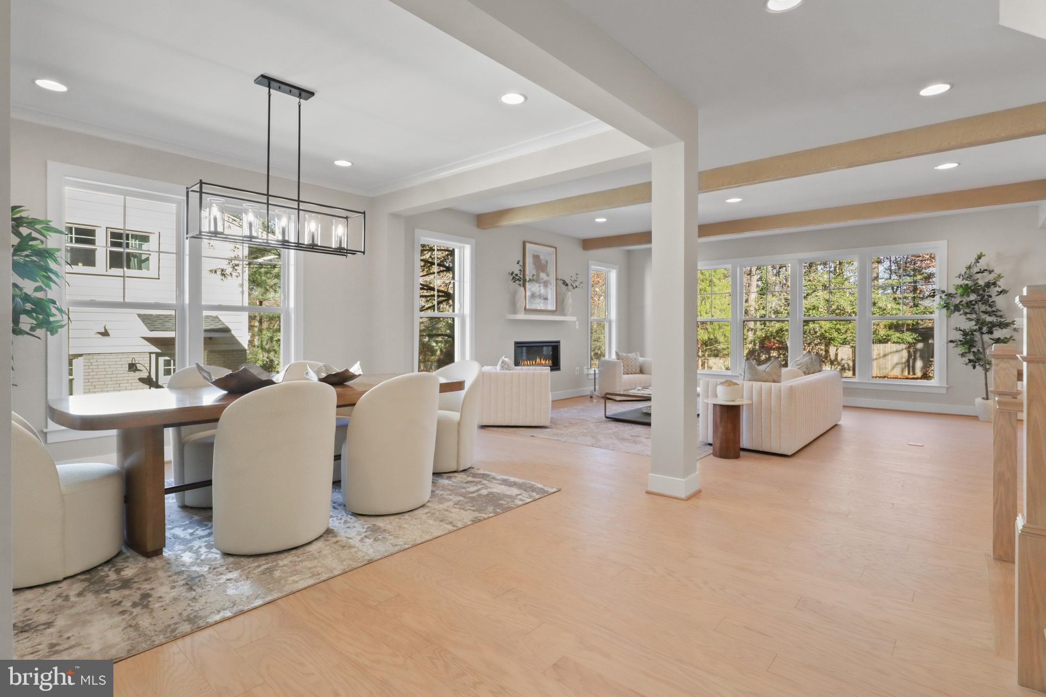 602 Kingsley Road Southwest Vienna, VA 22180 - Photo 13 of 79 a living room with patio furniture and a chandelier