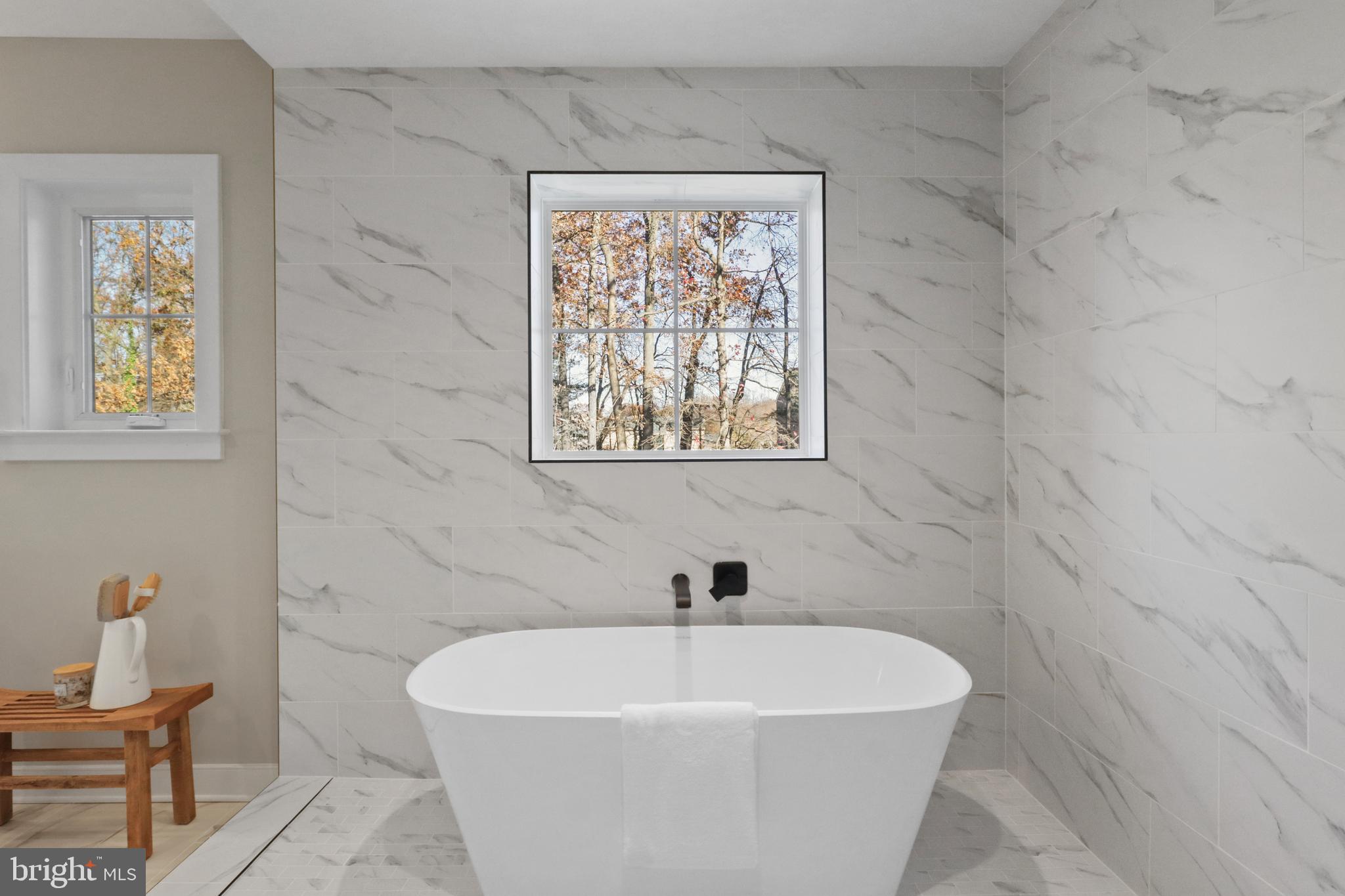 602 Kingsley Road Southwest Vienna, VA 22180 - Photo 36 of 79 a white bath tub sitting next to a white sink