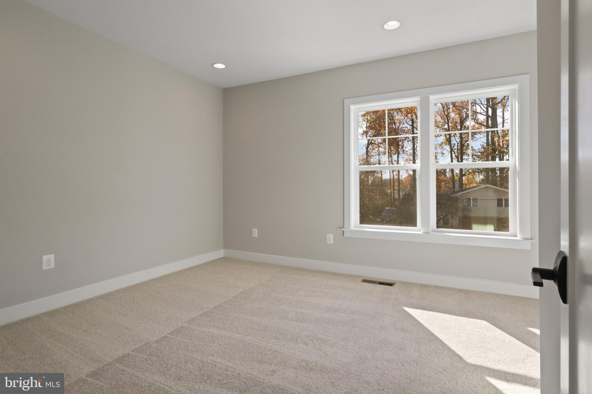602 Kingsley Road Southwest Vienna, VA 22180 - Photo 45 of 79 an empty room with a window