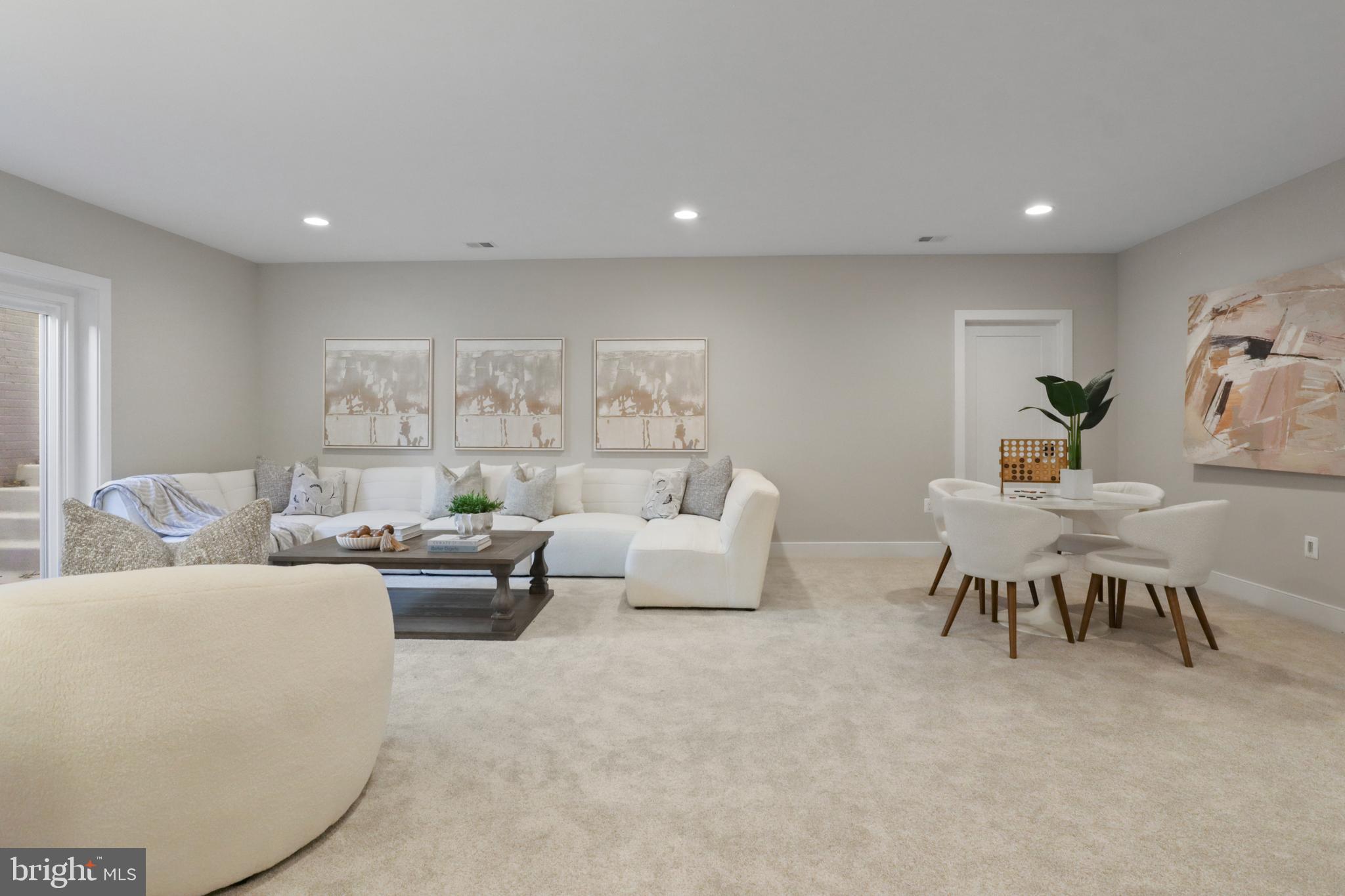 602 Kingsley Road Southwest Vienna, VA 22180 - Photo 53 of 79 a living room with furniture and a large window