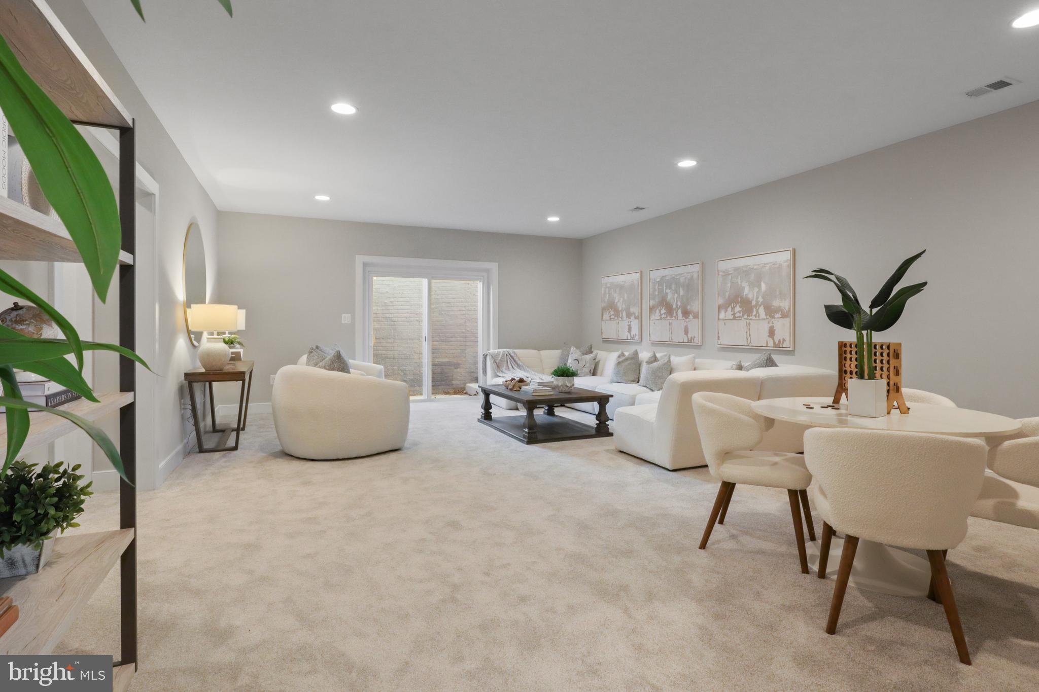 602 Kingsley Road Southwest Vienna, VA 22180 - Photo 54 of 79 a living room with furniture and a potted plant