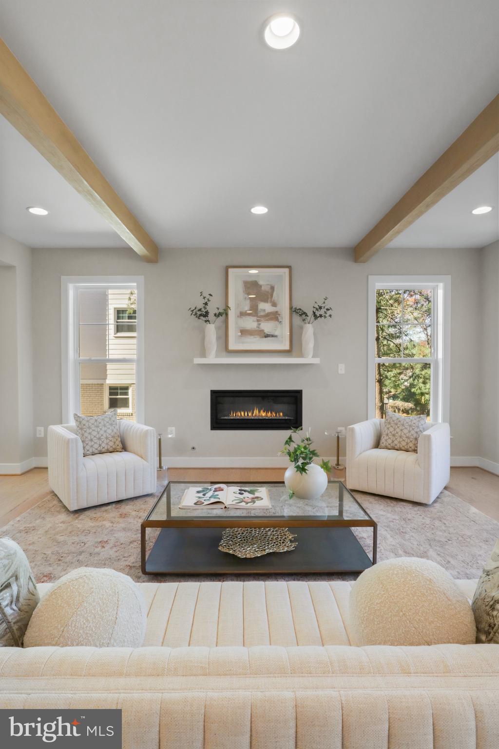 602 Kingsley Road Southwest Vienna, VA 22180 - Photo 60 of 79 a living room with furniture and a fireplace