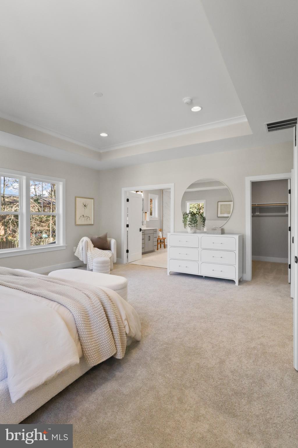 602 Kingsley Road Southwest Vienna, VA 22180 - Photo 67 of 79 a spacious bedroom with a bed and a large window