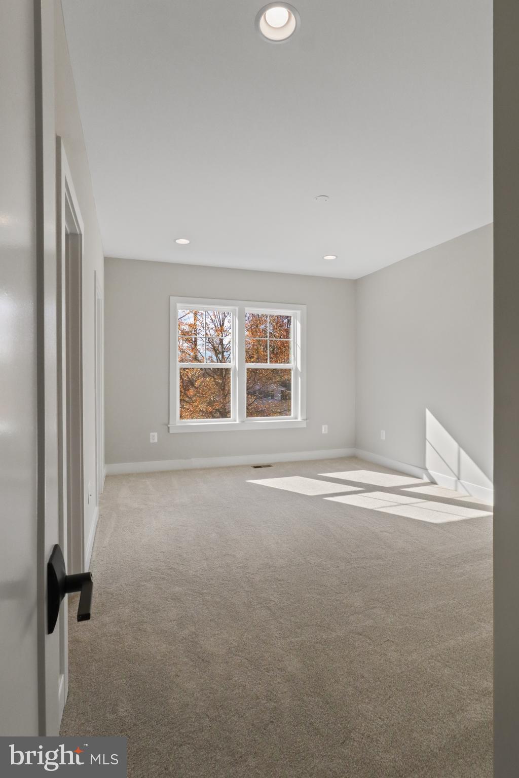602 Kingsley Road Southwest Vienna, VA 22180 - Photo 71 of 79 an empty room with windows