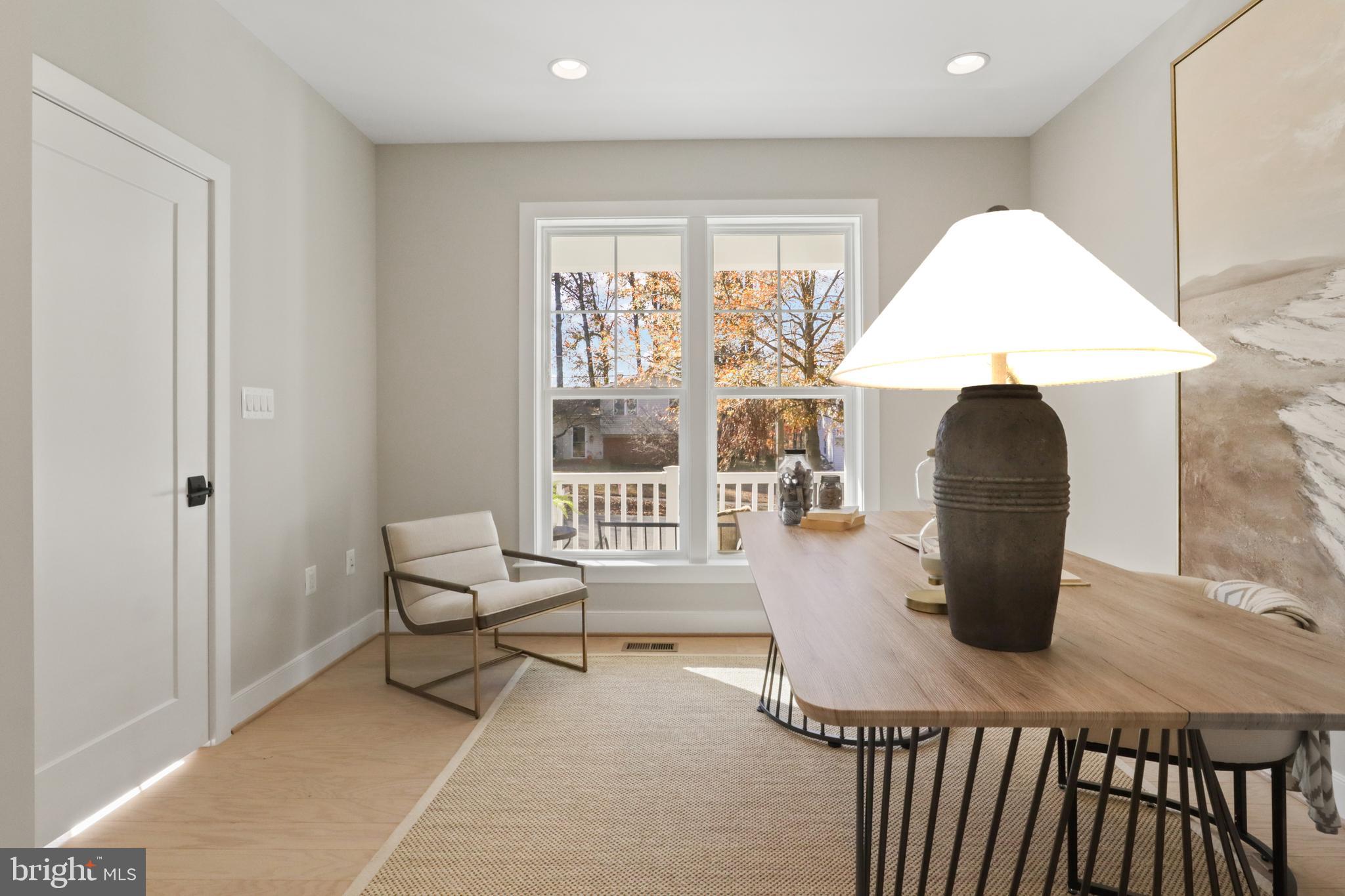 602 Kingsley Road Southwest Vienna, VA 22180 - Photo 8 of 79 a living room with furniture and a window