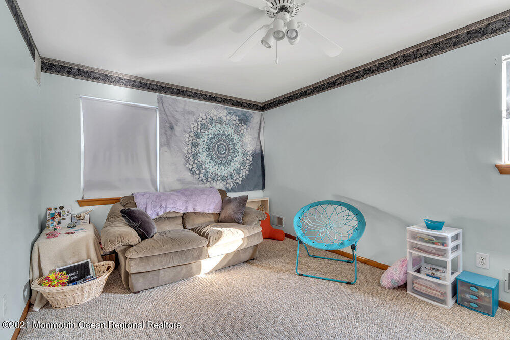 587 Reed Road Jackson, NJ 08527 - Photo 15 of 26 a living room with furniture