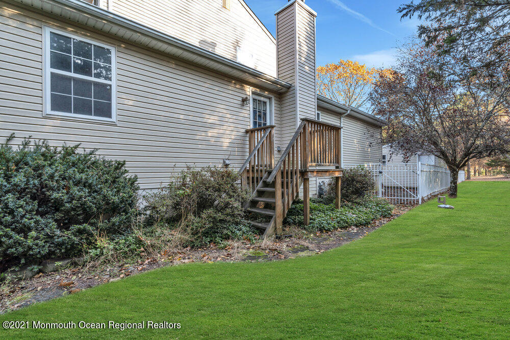 587 Reed Road Jackson, NJ 08527 - Photo 20 of 26 a view of a back yard of the house