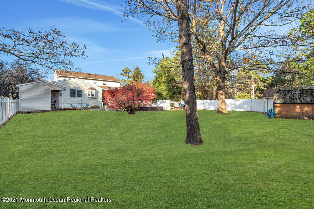 587 Reed Road Jackson, NJ 08527 - Photo 23 of 26 a view of a house with a yard