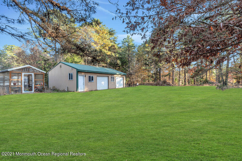 587 Reed Road Jackson, NJ 08527 - Photo 24 of 26 a view of a house with a big yard
