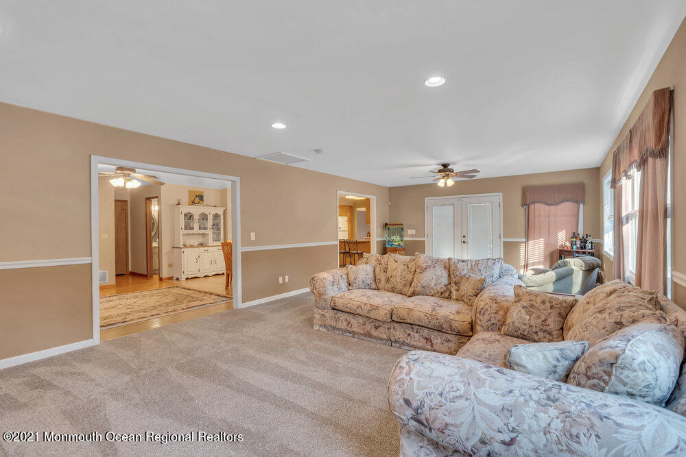 587 Reed Road Jackson, NJ 08527 - Photo 8 of 26 a living room with furniture and a area