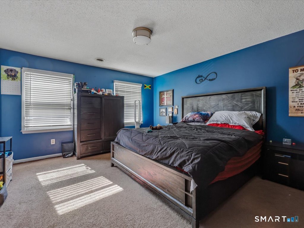 246 Reeds Gap Road, Unit 5C North Branford, CT 06472 - Photo 18 of 27 Primary Bedroom suite