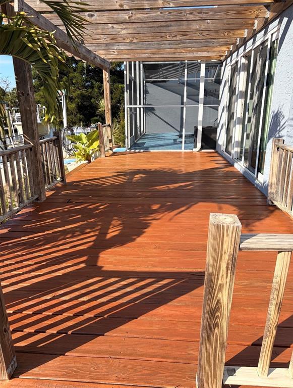 9917 San Sierra Way Port Richey, FL 34668 - Photo 2 of 33 a view of a backyard with stairs and a patio