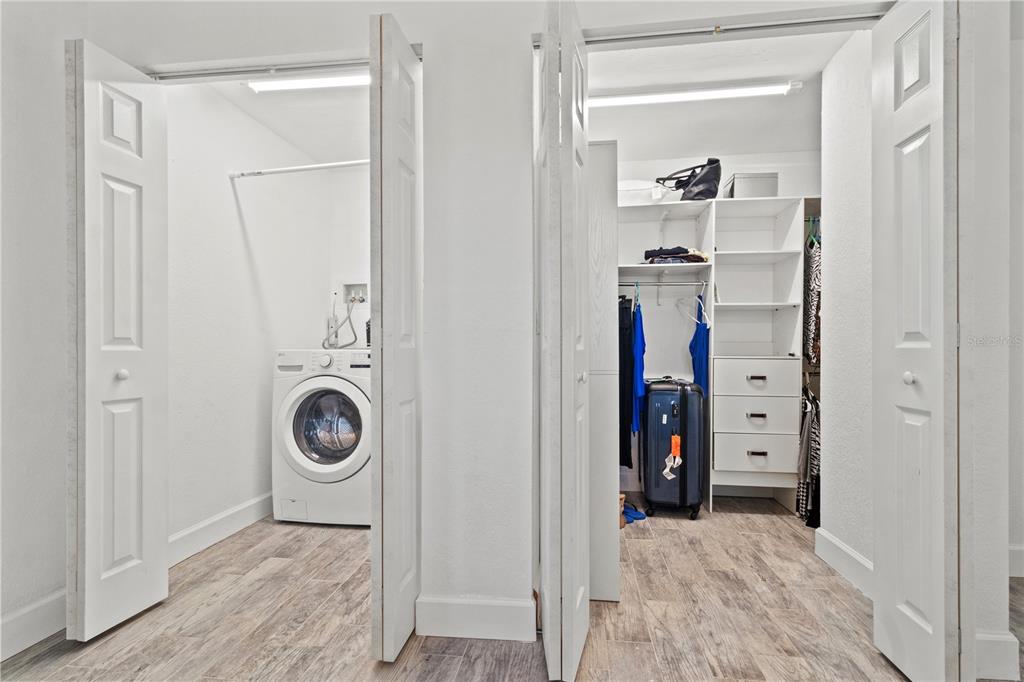 9917 San Sierra Way Port Richey, FL 34668 - Photo 21 of 33 a view of a storage & utility room with washer and dryer