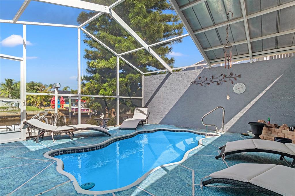 9917 San Sierra Way Port Richey, FL 34668 - Photo 23 of 33 a view of a balcony with chairs