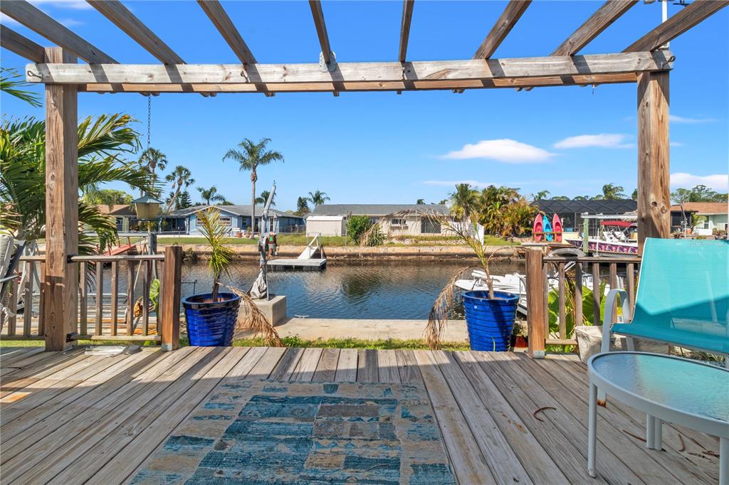 9917 San Sierra Way Port Richey, FL 34668 - Photo 25 of 33 a view of a balcony with wooden floor