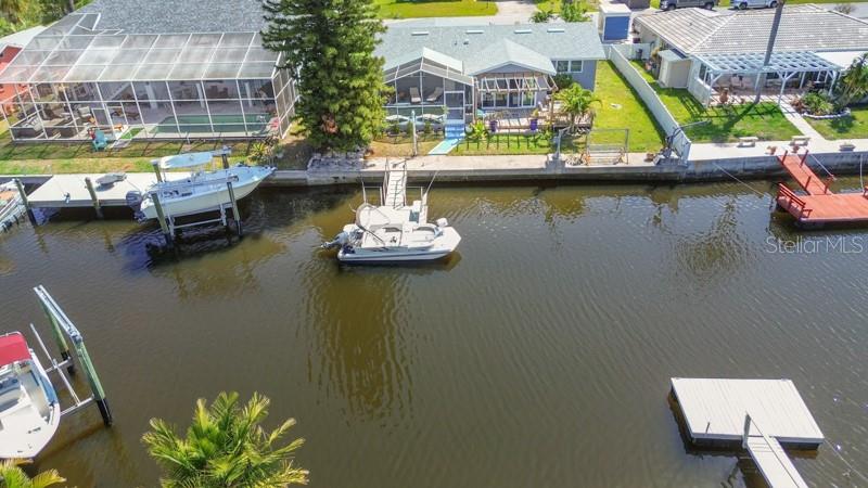 9917 San Sierra Way Port Richey, FL 34668 - Photo 32 of 33 an aerial view of house with outdoor space