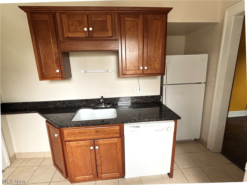 2469 Overlook Road, Unit 1 Cleveland Heights, OH 44106 - Photo 5 of 20 Granite counter tops and dishwasher and refrigerator.