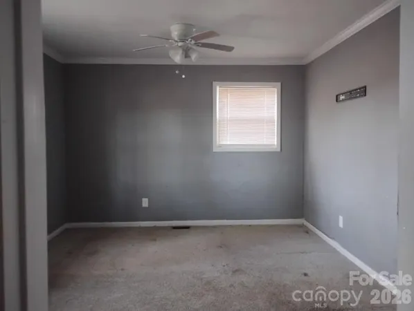 an empty room with a window