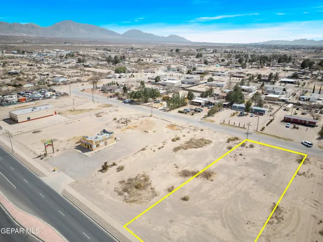 an aerial view of beach and ocean