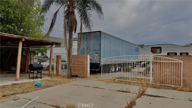a kitchen that has a sink and cabinets