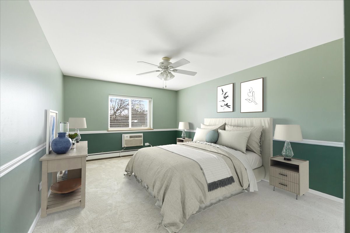 1311 South Finley Road, Unit 203 Lombard, IL 60148 - Photo 15 of 20 a spacious bedroom with a bed and window