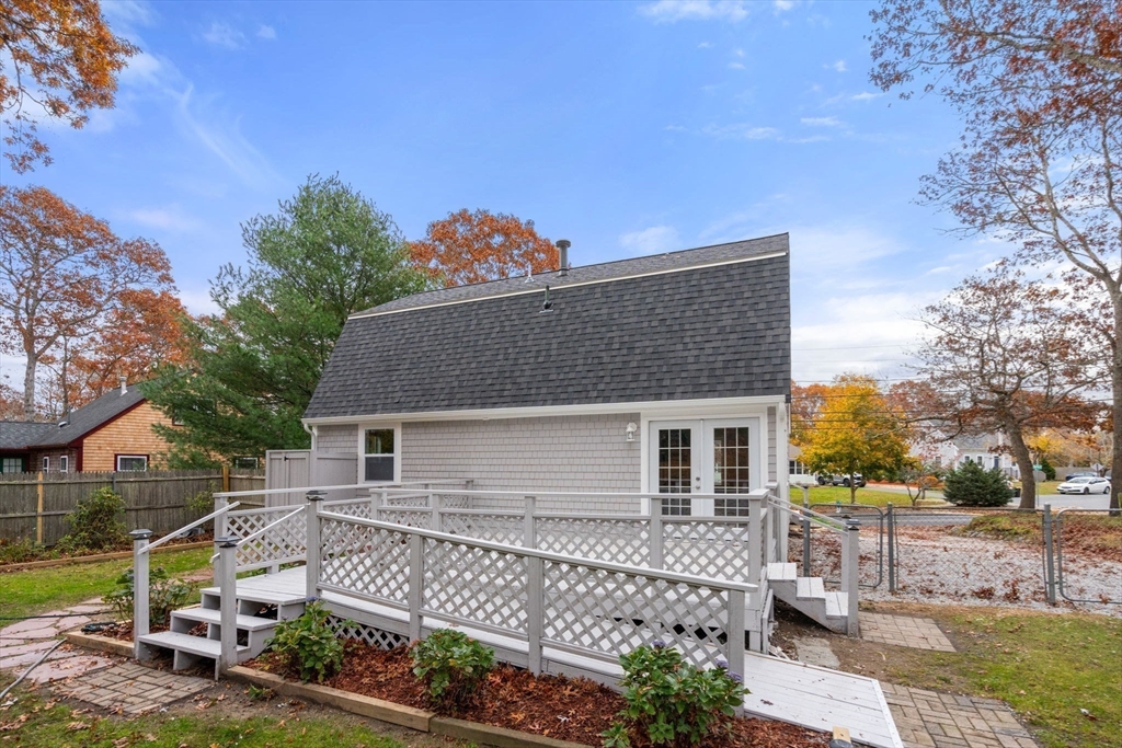 130 Old Barnstable Road Falmouth, MA 02536 - Photo 31 of 38 a front view of a house with garden