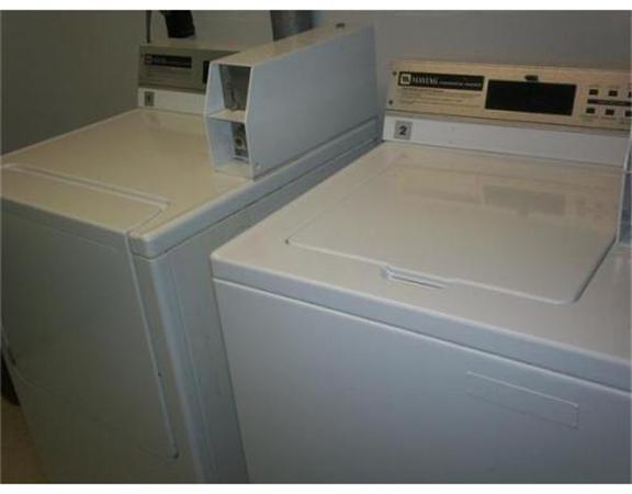 7 Beal's Cove Road, Unit 7G Hingham, MA 02043 - Photo 9 of 12 a utility room with dryer and washer