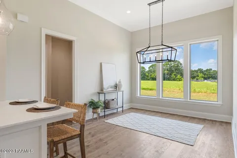 $499,000 | 104 Carriage Lakes Drive, Youngsville, LA 70592