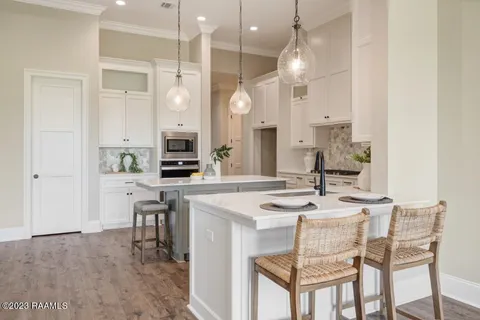 $499,000 | 104 Carriage Lakes Drive, Youngsville, LA 70592