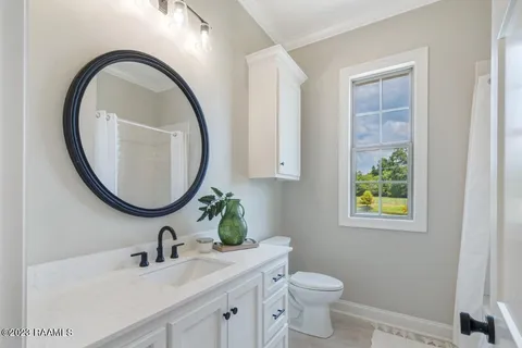 $499,000 | 104 Carriage Lakes Drive, Youngsville, LA 70592