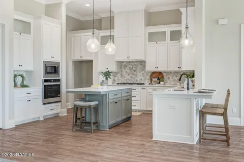 $499,000 | 104 Carriage Lakes Drive, Youngsville, LA 70592