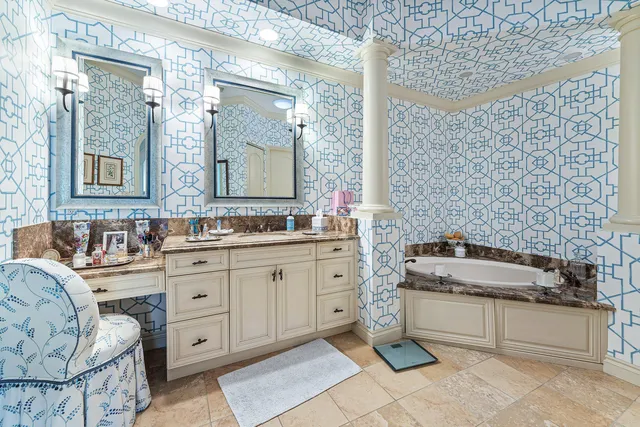 a bathroom with a bathtub and shower