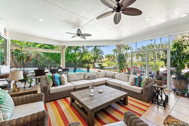 a view of a backyard with swimming pool