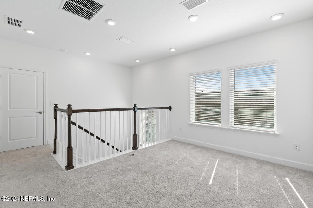 116 Alston Dr Street St. Augustine, FL 32092 - Photo 26 of 58 a view of an empty room with a window