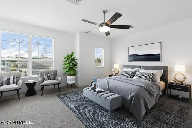 a bathroom with double sink and a mirror