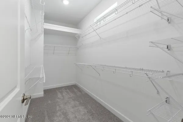 a bathroom with a toilet a sink and a bathtub